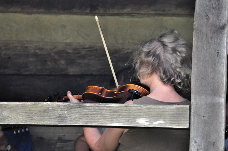 fiddler on porch